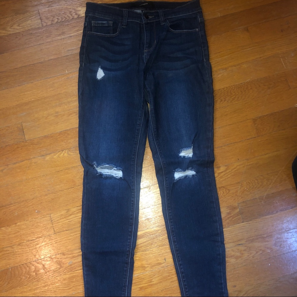 Jeans with distressed rips